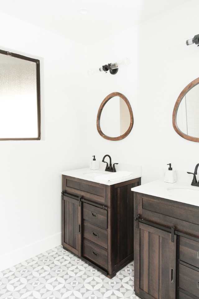 porcelain mosaic tile in rustic chic bathroom with double vanities
